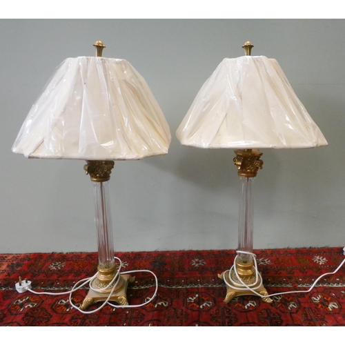 362 - A tall pair of modern glass column table lamps and shades