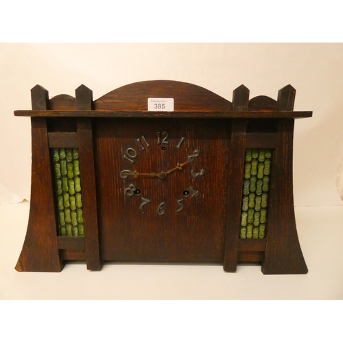 385 - An American arts and crafts oak mantel clock. US Gilbert Clock Co. Winstead Con. USA.