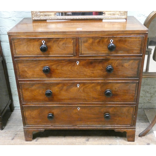 390 - A Georgian mahogany satinwood strung chest of two short and three long drawers with bone keyhole esc... 