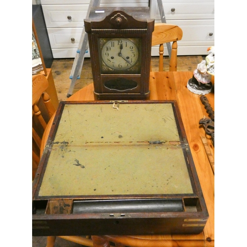 423 - A Victorian mahogany brass mounted writing slope together with a mahogany cased mantel clock.