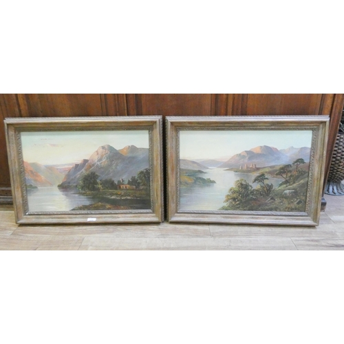 428 - F E Jamieson - a pair of oil on canvas highland lake scenes, both in gilt frames, signed lower right... 