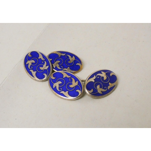 696 - A pair of Longmire silver and blue enamel cufflinks, in original box