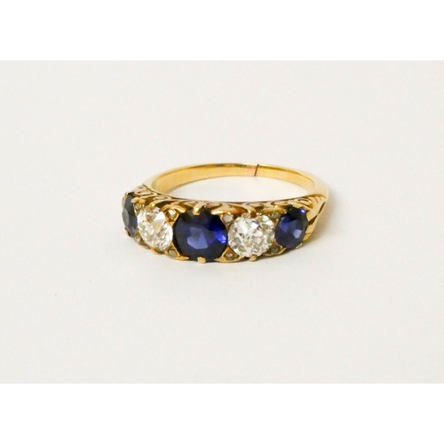 708 - A Victorian sapphire and diamond five stone ring, comprising three sapphires spaced by two old-cut d... 