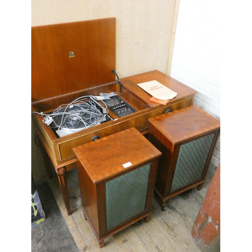 828 - A Garrard Dynatron radio in walnut cabinet with two cased speakers