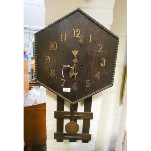 305 - A 1920's/1930's hexagonal oak wall clock