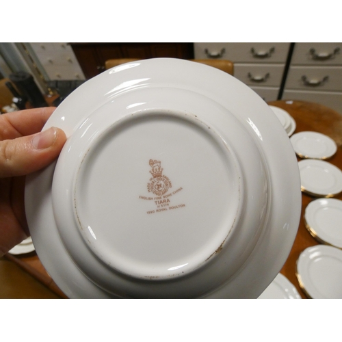 312 - A large quantity of Royal Doulton white and gilt boarded tiara patterned dinnerware, teaware, coffee... 