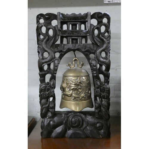 6 - A Chinese bell and gong on carved wooden stand