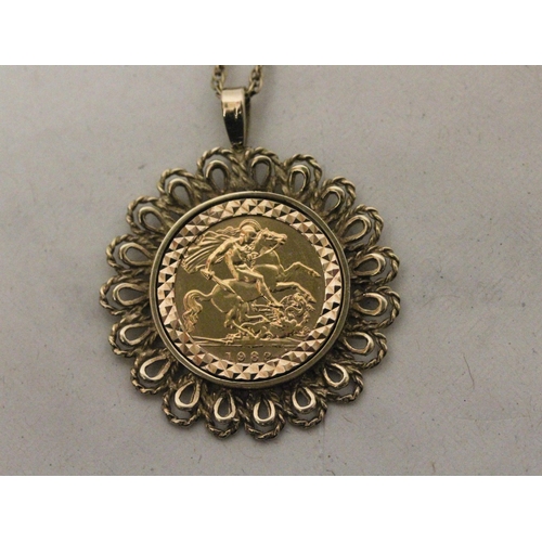 567 - Queen Elizabeth II 1982 Half Gold Sovereign, mounted in an openwork pendant mount, suspended from a ... 