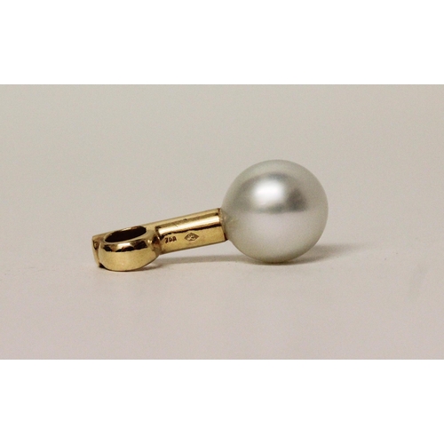 579 - South Sea pearl and diamond pendant, the 11 mm pearl suspended from an 18ct yellow gold pave diamond... 