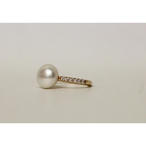 580 - South Sea pearl and diamond ring, the 11 mm pearl mounted on 18ct yellow gold pave diamond set shoul... 