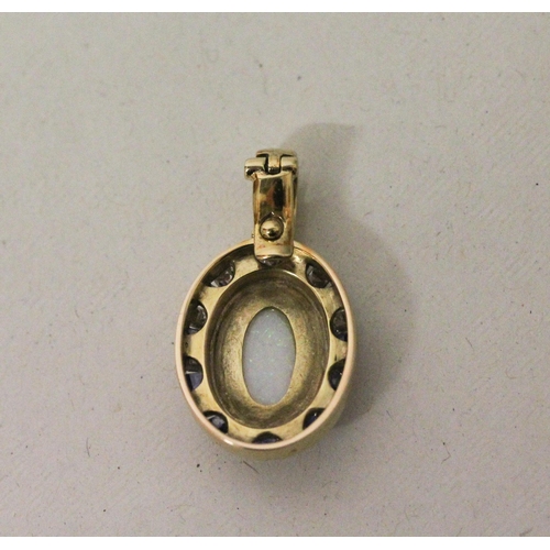 593 - An opal, sapphire and diamond oval pendant enhancer, bespoke made in 18ct yellow gold. Unmarked. Ope... 