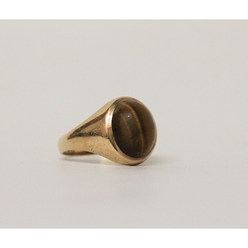 603 - A 9ct yellow gold tigers eye signet ring, hallmarked, ring size  O, gross weight 3.6g