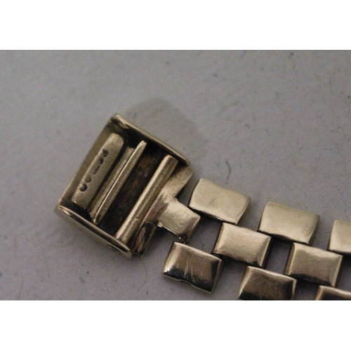 608 - A polished flattened link 9ct gold bracelet, with box clasp. Hallmarked. 7