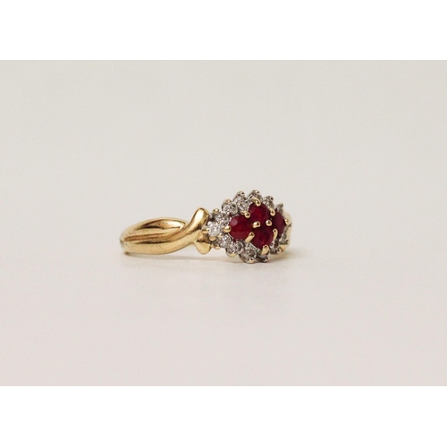 610 - A ruby and diamond cluster ring, on 18ct yellow gold hallmarked band, ring size Q, gross weight 3.8g