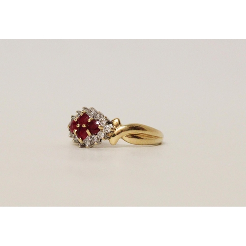 610 - A ruby and diamond cluster ring, on 18ct yellow gold hallmarked band, ring size Q, gross weight 3.8g