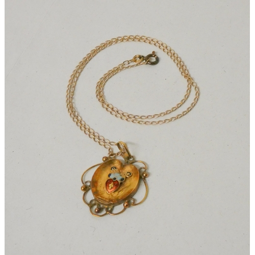 632 - An Arts & Crafts gold and enamel pendant, on a fine 9ct gold chain. Chain hallmarked. Gross weight 5... 