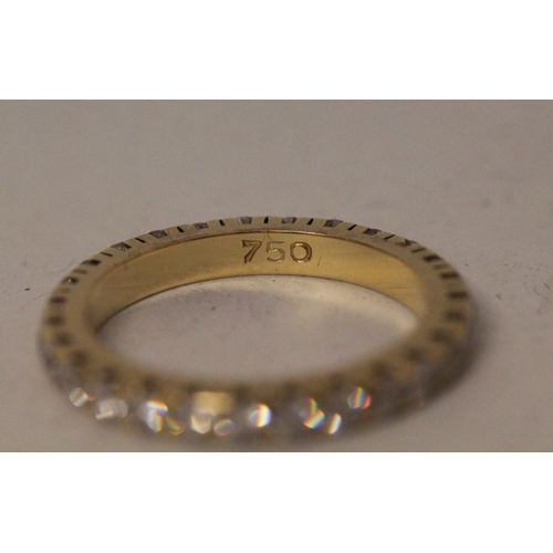 660 - A diamond eternity ring, fully diamond set with brilliant cut diamonds, in 18ct yellow gold. Ring si... 