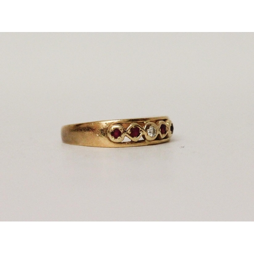 666 - A ruby and diamond ring, on 18ct yellow gold band, ring size I, marked 750. Gross weight 3 grams