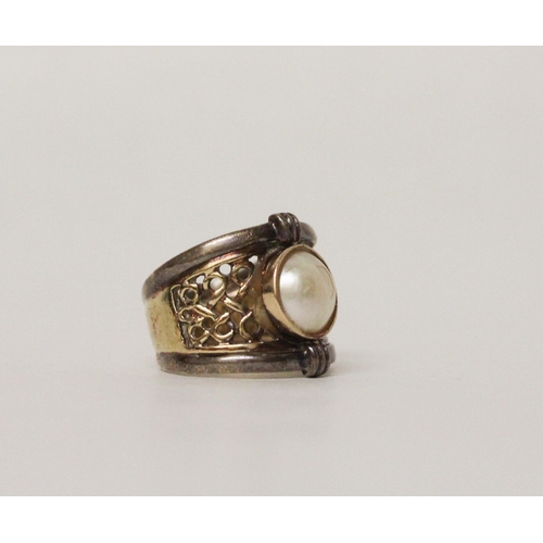 675 - A modern pearl dress ring, wide 9ct gold band set with a mabe pearl. Marked 9k, ring size L, gross w... 