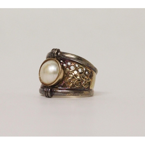 675 - A modern pearl dress ring, wide 9ct gold band set with a mabe pearl. Marked 9k, ring size L, gross w... 