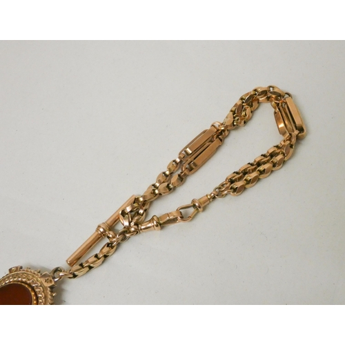 681 - Victorian 9ct rose gold fancy link watch albert chain, with T bar and hardstone set swivel fob. Used... 