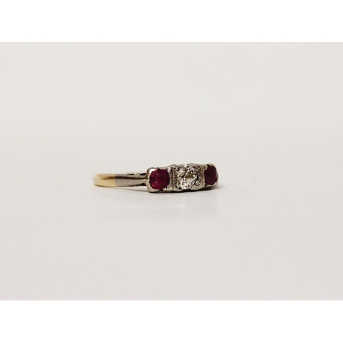 682 - A vintage 18ct gold platinum mounted three stone ruby and diamond ring, Ring size L, gross weight 2.... 