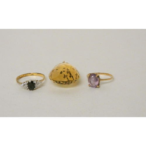 683 - A large tear drop shaped faceted citrine pendant and an amethyst single stone dress ring on 9ct band... 