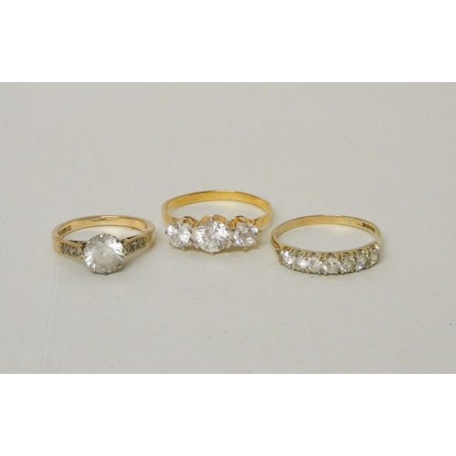 684 - A 9ct gold and CZ half hoop eternity ring, and a 9ct single stone dress ring, both hallmarked, and a... 