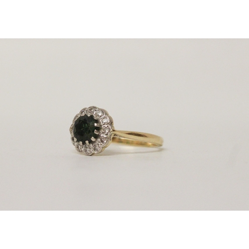 685 - 18ct gold green tourmaline and diamond circular  cluster ring, hallmarked, ring size V, gross weight... 