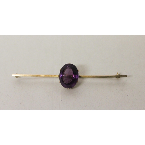 700 - An Edwardian amethyst bar brooch, bar marked 10ct. In Hamilton & Inches fitted red leather box. Gros... 