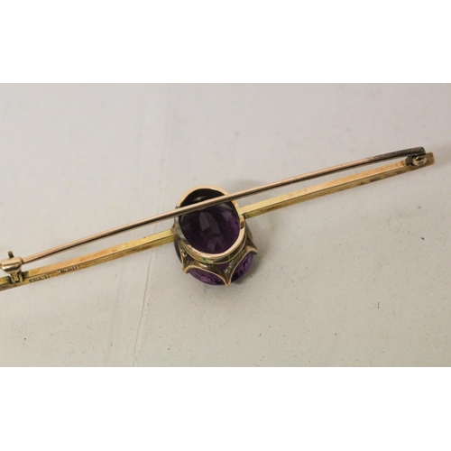 700 - An Edwardian amethyst bar brooch, bar marked 10ct. In Hamilton & Inches fitted red leather box. Gros... 