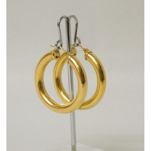 709 - A pair of Italian 18ct yellow gold large polished hoop earrings. Marked 750, gross weight 11.7g