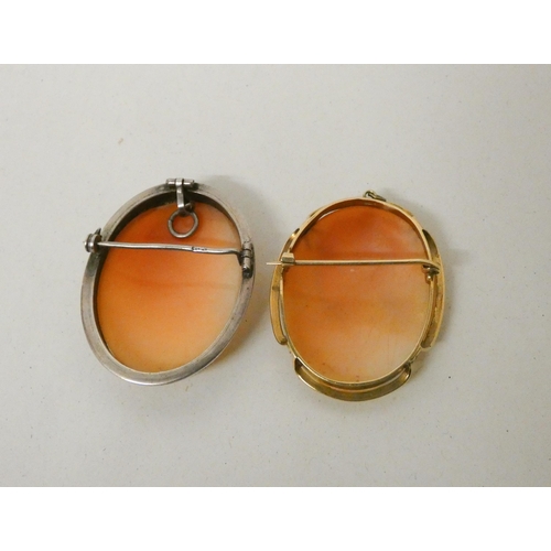 727 - An oval carved shell cameo in 9ct gold frame and another similar cameo in silver frame