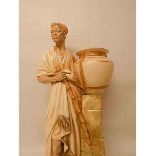 201 - A large Royal Worcester Blush Ivory figure of an African water carrier. 46cm tall