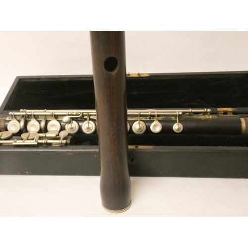 209 - A rosewood and silver plated mounted flute marked S Quilter, London in fitted case