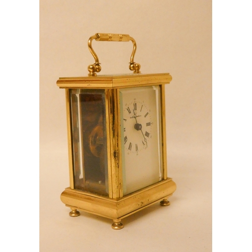 210 - A good quality modern presentation carriage clock retailed by Boodle and Dunthorne