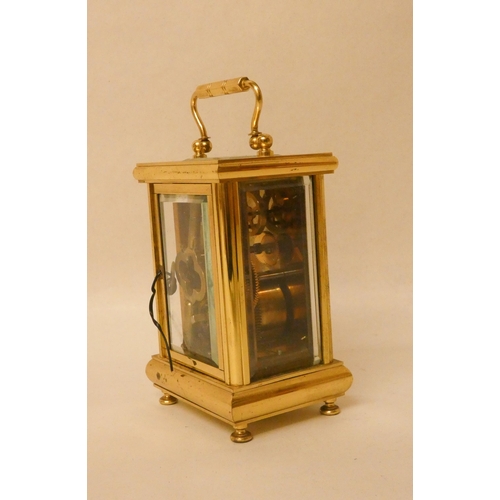 210 - A good quality modern presentation carriage clock retailed by Boodle and Dunthorne