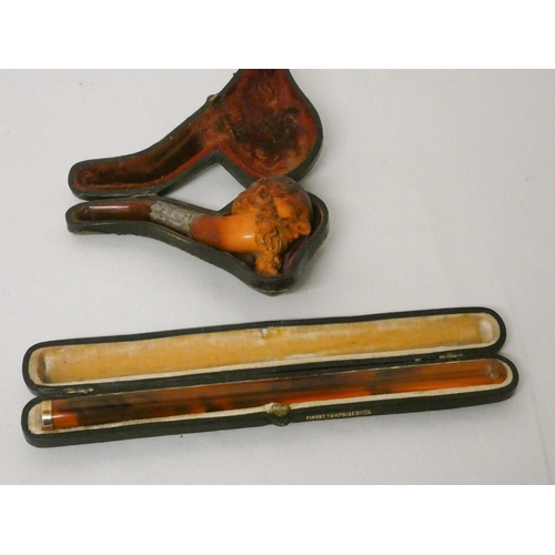 211 - A gold mounted tortoiseshell cigar holder in case and a silver mounted carved Meersham pipe