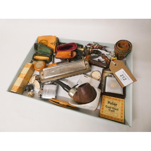 212 - A tray of collectables to include a Hohner mouth organ, smoking accessories, treen notebook, painted... 