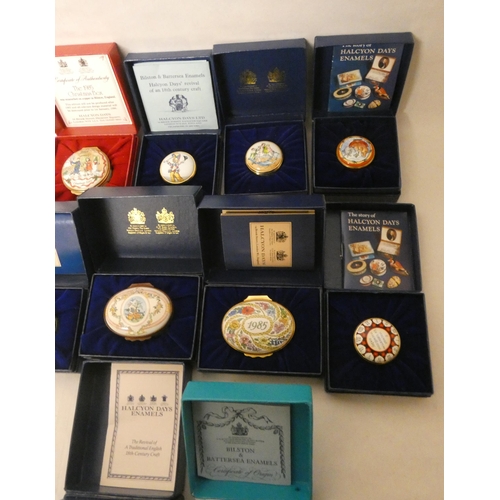 222 - A collection of ten Halcyon Days enamelled trinket boxes to include Year's to Remember, Christmas ex... 