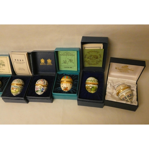 237 - A collection of six Halcyon Days Easter Eggs of various years in original boxes and one Crummles ena... 