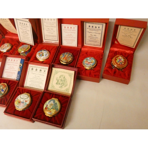 241 - A collection of ten Halcyon Days porcelain Christmas trinket boxes of various years with original bo... 