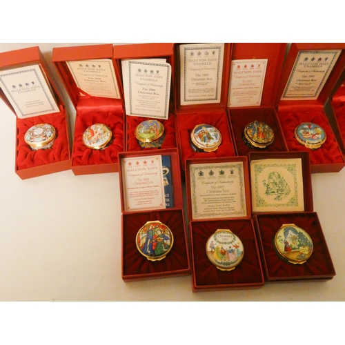 241 - A collection of ten Halcyon Days porcelain Christmas trinket boxes of various years with original bo... 