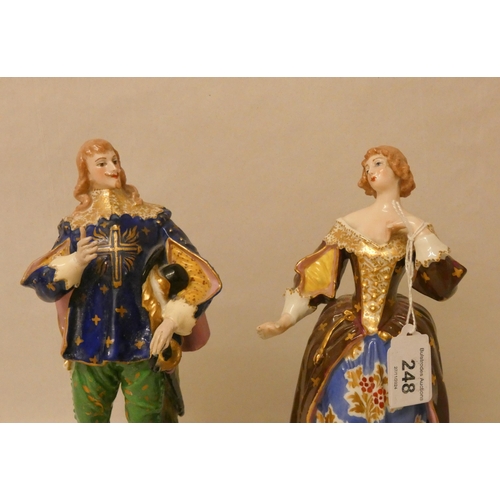 248 - Two Crown Derby porcelain figurines of a Gallant couple. Crown Derby marks to the bases