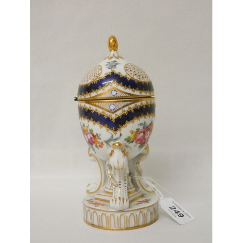 249 - A Sevres porcelain cobalt and gilt pot pourri jar. Sevres marks to base. 17cm high approx.