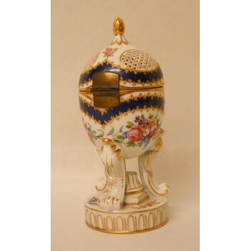 249 - A Sevres porcelain cobalt and gilt pot pourri jar. Sevres marks to base. 17cm high approx.