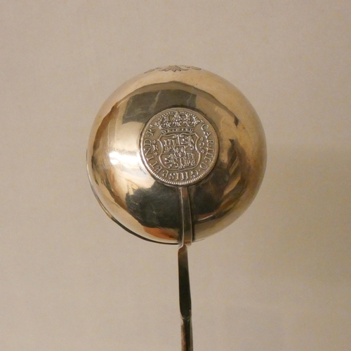 503 - An antique brandy ladle with coin inset to the bowl