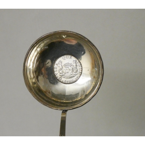 503 - An antique brandy ladle with coin inset to the bowl