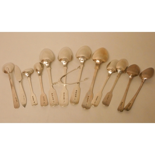 504 - A collection of Georgian and later silver spoons, pair of sugar nips and a butter knife. Gross weigh... 