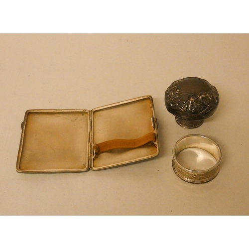 511 - A silver and enamel cigarette case, a silver top and a silver serviette ring, gross weight 4 troy ou... 